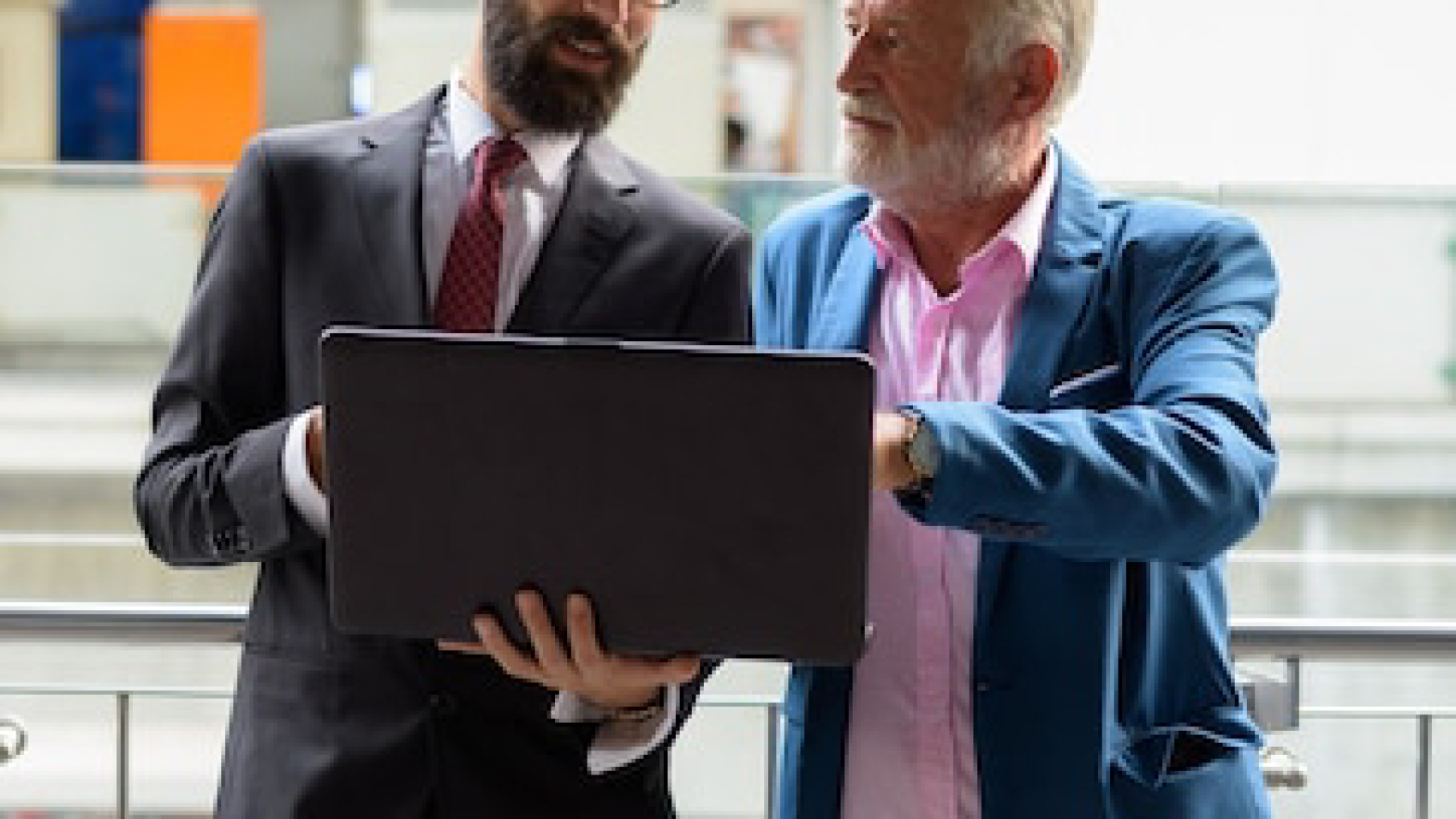 two-multi-ethnic-bearded-businessmen-together-arou